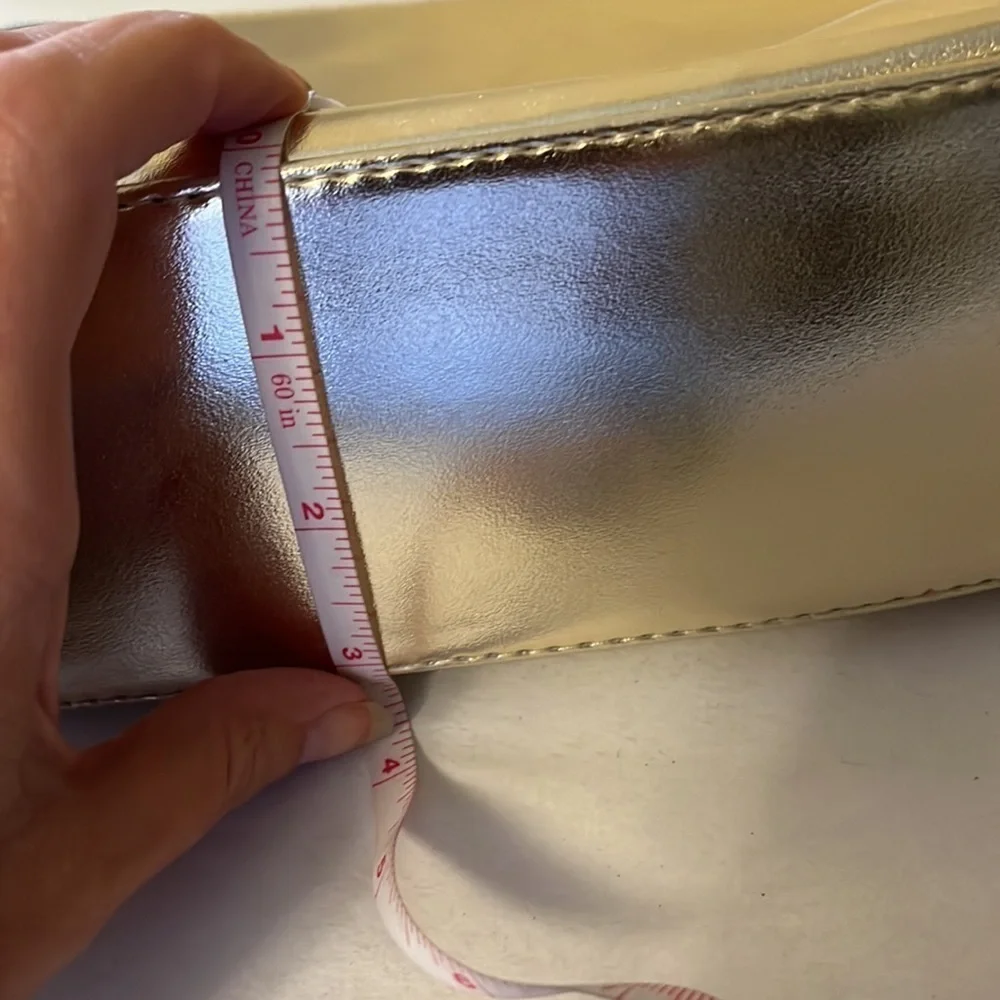 Gold Victoria’s Secret cosmetics/ small carrying bag with handle, studded heart